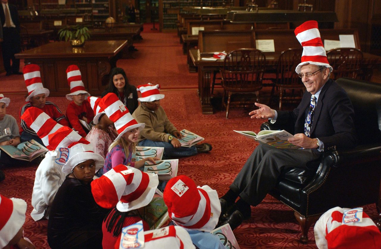 Breyer reads Dr. Seuss' "Oh, the Places You'll Go!" to elementary school students who were visiting the Supreme Court in March 2003. It was National Read Across America Day.