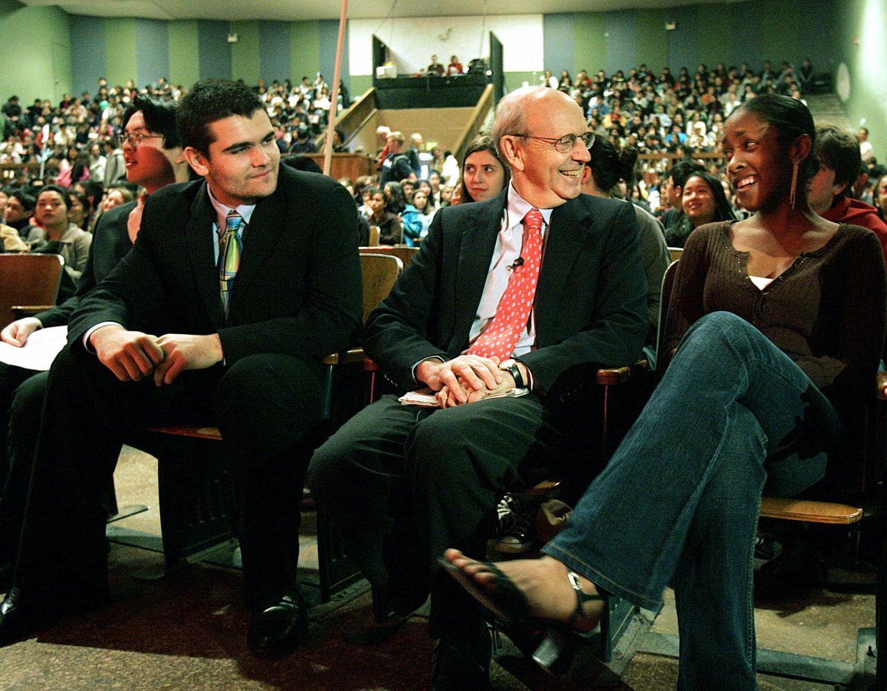 Breyer is seated between students Cole Mitguard, left, and C.J. Mourning while visiting San Francisco's Lowell High School in February 2006. Breyer graduated from Lowell in 1955.