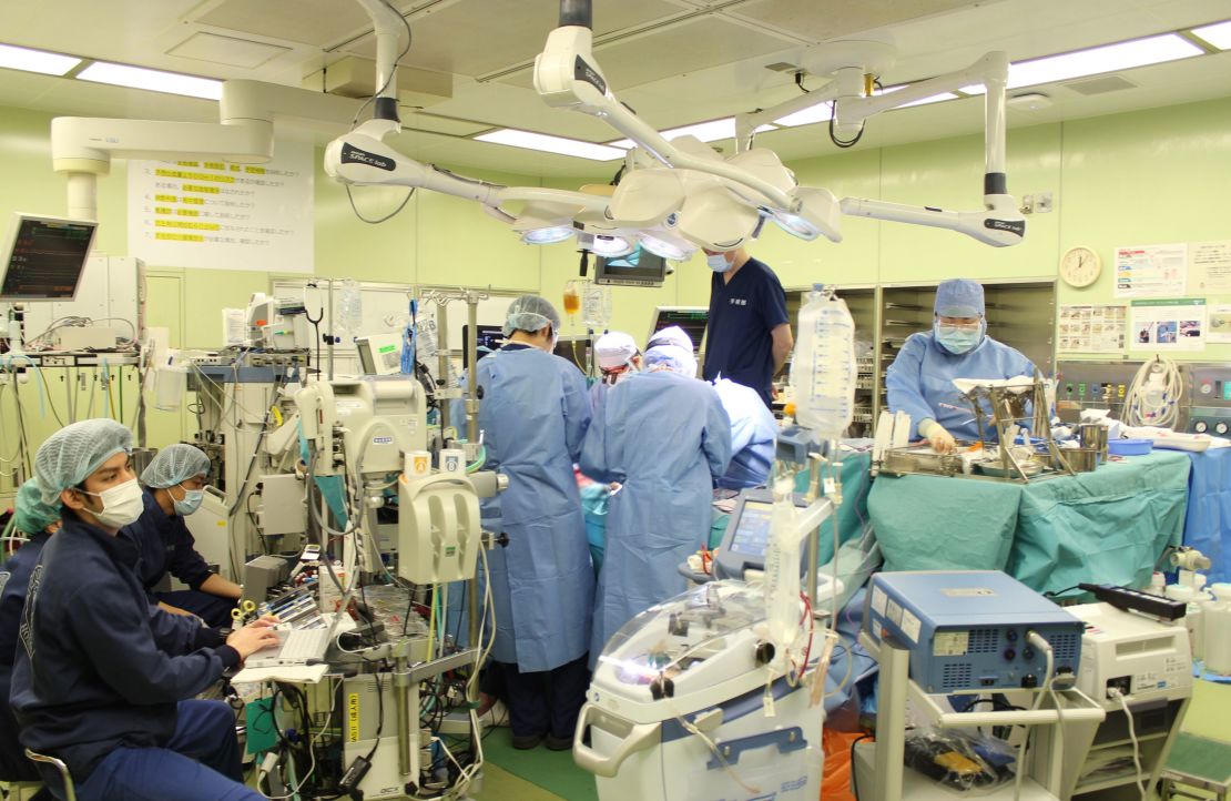 Japanese doctors perform a lung transplant on a Covid-19 patient. 