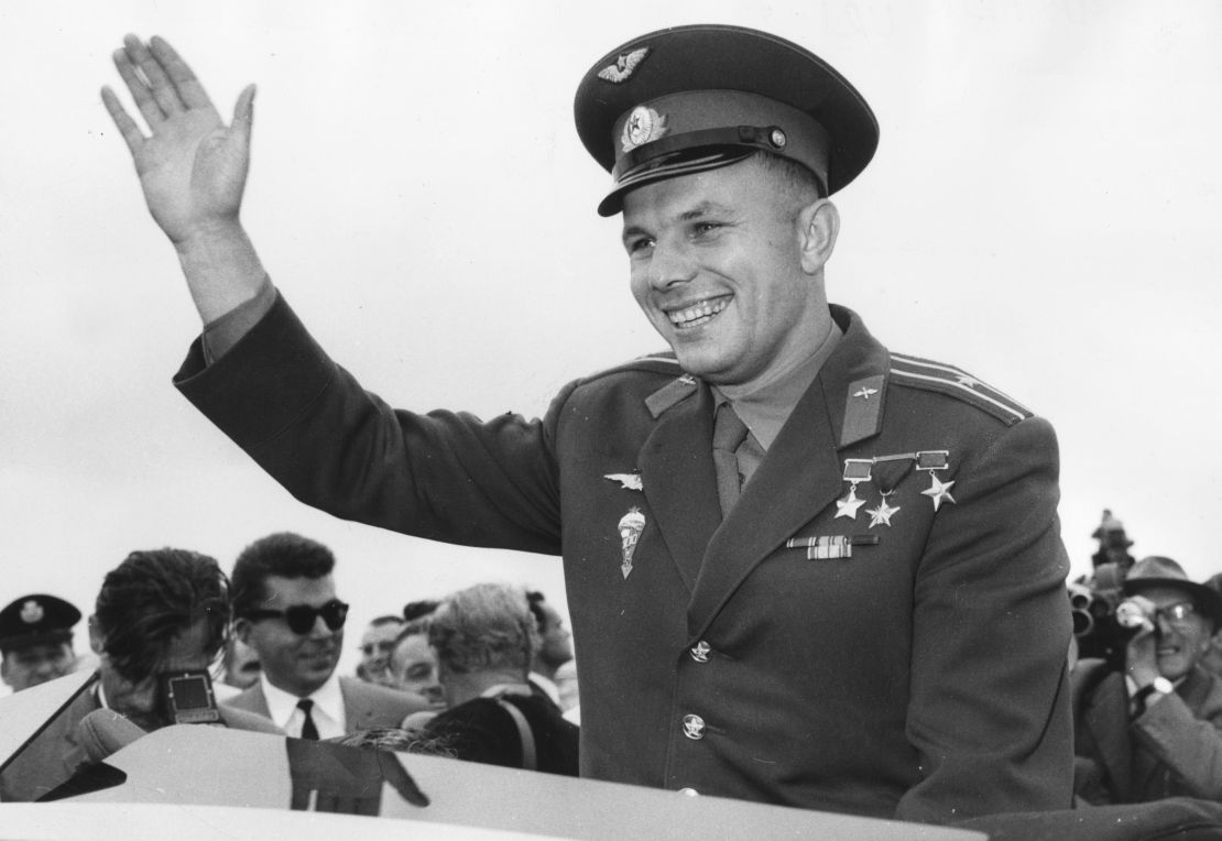 Gagarin waves to crowds who have come to see him at the Soviet exhibition at London's Earls Court, July 11, 1961.