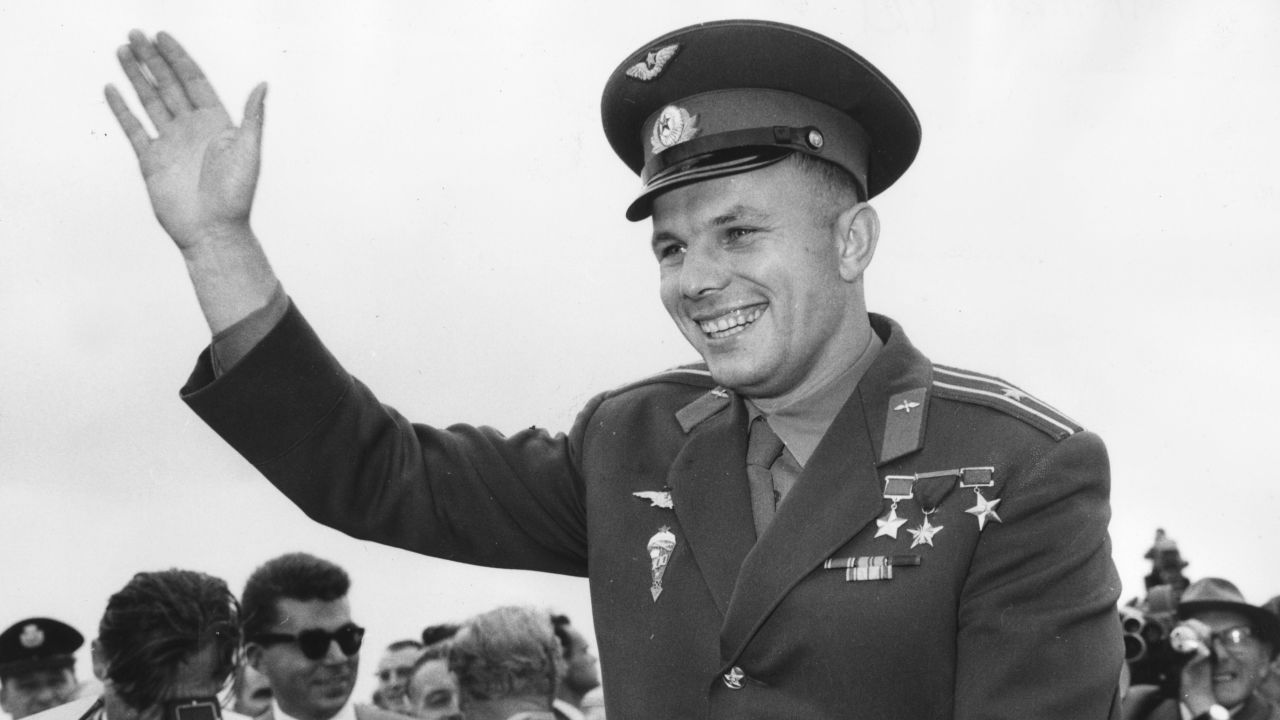 Gagarin waves to crowds who have come to see him at the Soviet exhibition at London's Earls Court, July 11, 1961.