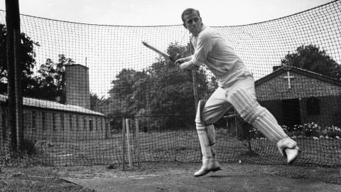 Prince Philip practices cricket while in the Royal Navy in 1947.