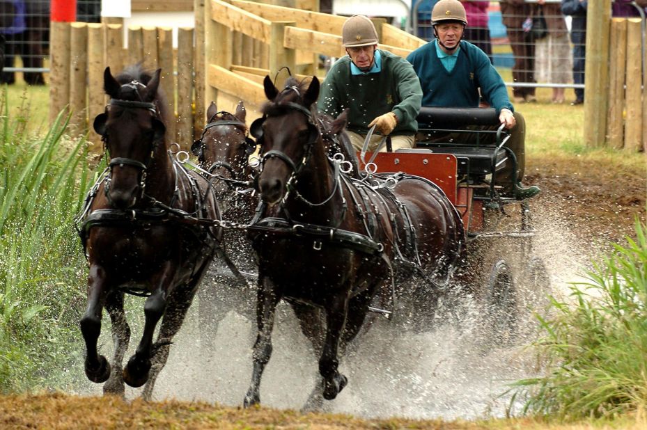 Prince Philip competes in the Sandringham Country Show's horse driving trials in 2005.