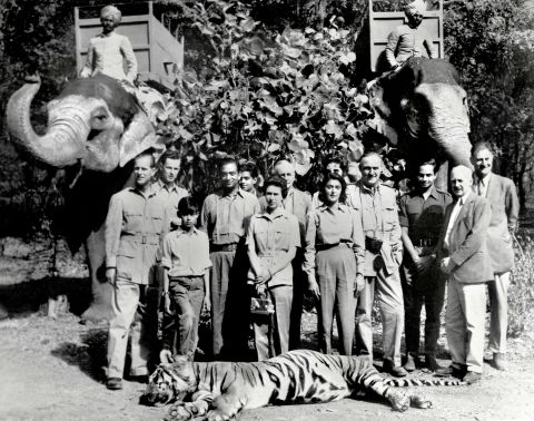 The Queen, center, and Prince Philip, left, pose with a tiger Philip killed on a hunting trip in India in 1961. They are seen with the Maharaja and the Maharani of Jaipur.
