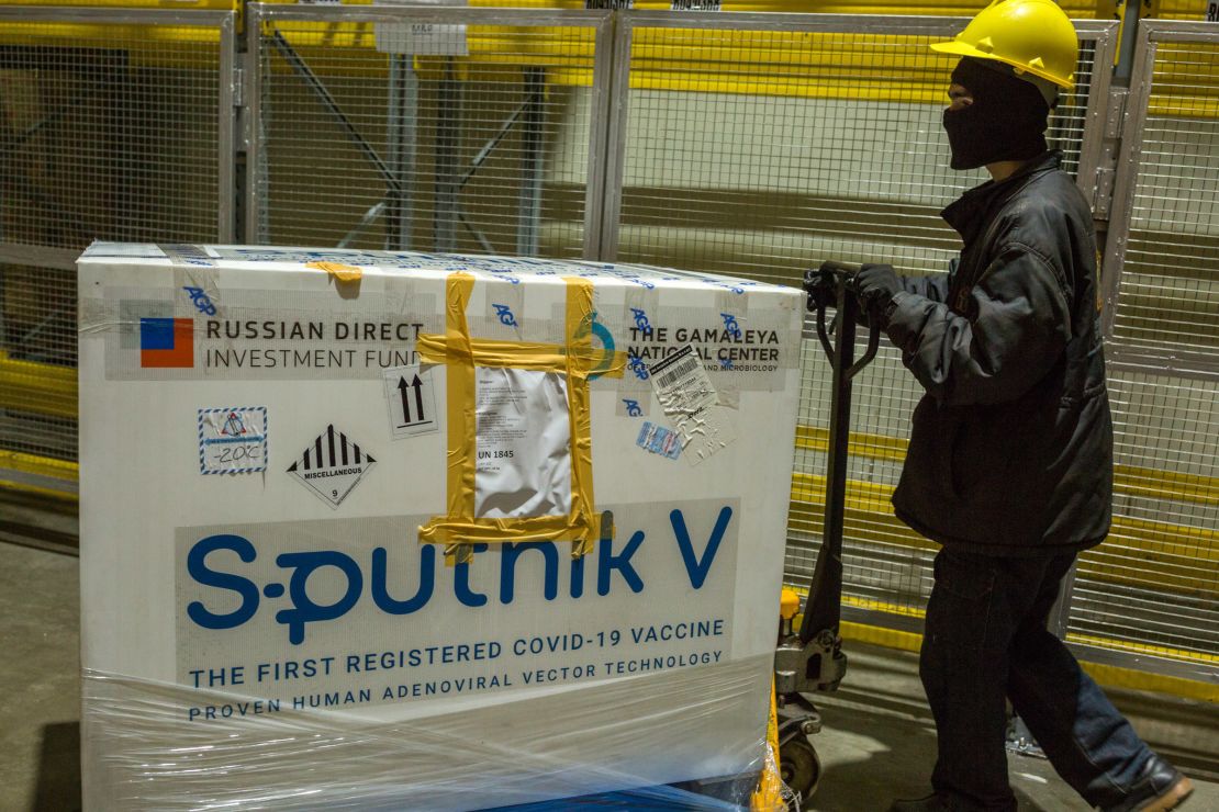 A worker transports a crate of the Sputnik V Covid-19 vaccine in Karachi, Pakistan, on March 19.