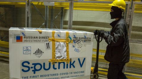 A worker transports a crate of the Sputnik V Covid-19 vaccine in Karachi, Pakistan, on March 19.