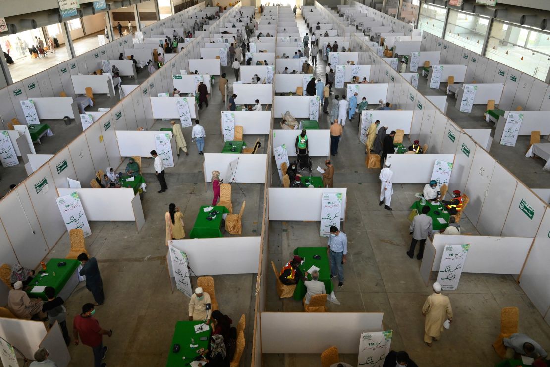 People receive the Sinopharm Covid-19 vaccine at a vaccination center in Lahore, Pakistan, on April 1.