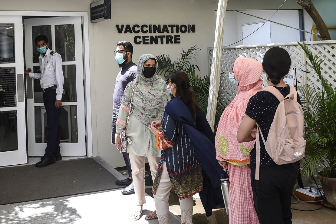 People wait to receive a dose of Russia's Sputnik V vaccine in Karachi, Pakistan, on April 5.