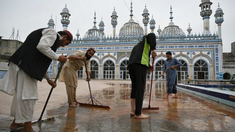 Muslim devotees wash the floor of the Jamia Mosque in Rawalpindi, Pakistan, on April 6, ahead of Ramadan.