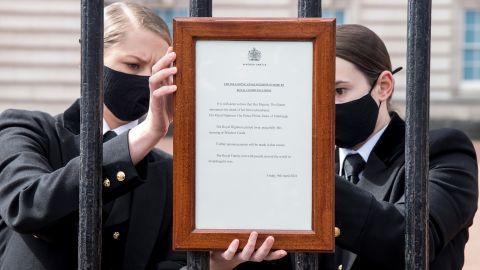 A sign announcing the death of Prince Philip is placed on the gates of Buckingham Palace in London. 
