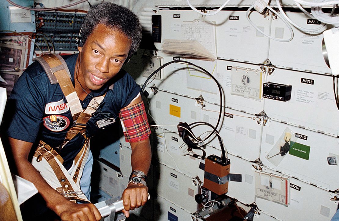 Guion "Guy" Bluford Jr., the first African American person in space, exercises on the space shuttle Challenger's treadmill. 