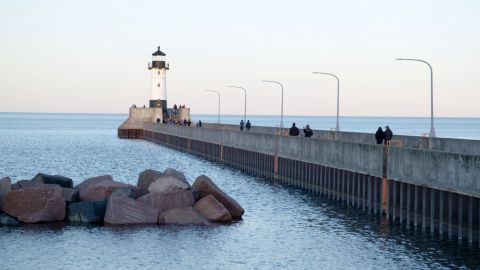 The light house along Canal Park, a popular tourist destination, guides ships into Duluth's harbor