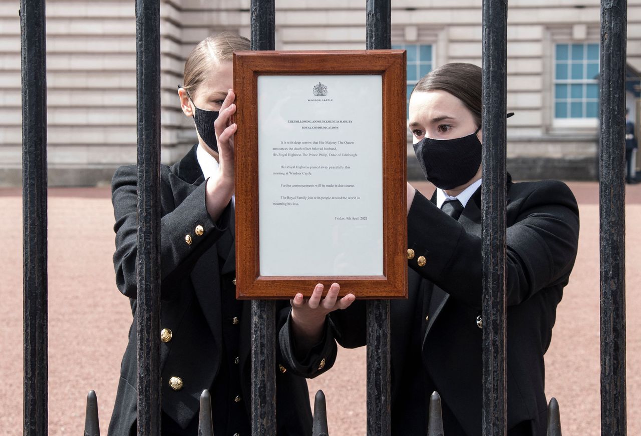 An official notice announcing Philip's death is placed on the gates of Buckingham Palace.