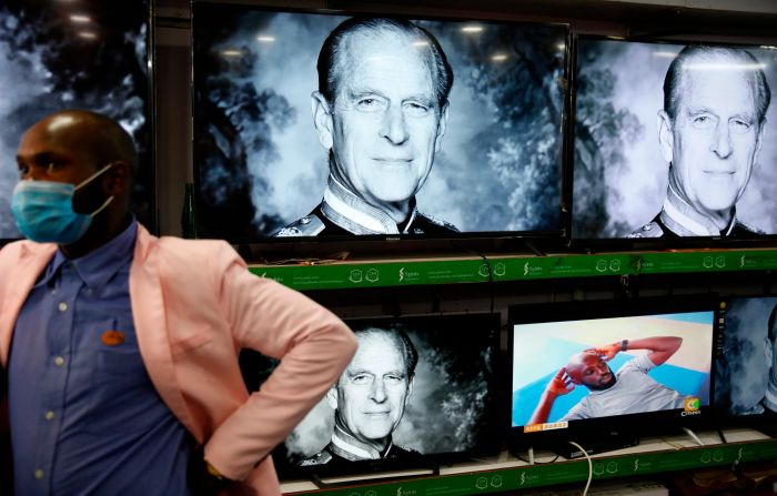 News of Philip's death can be seen on television screens at a shop in Nairobi, Kenya.
