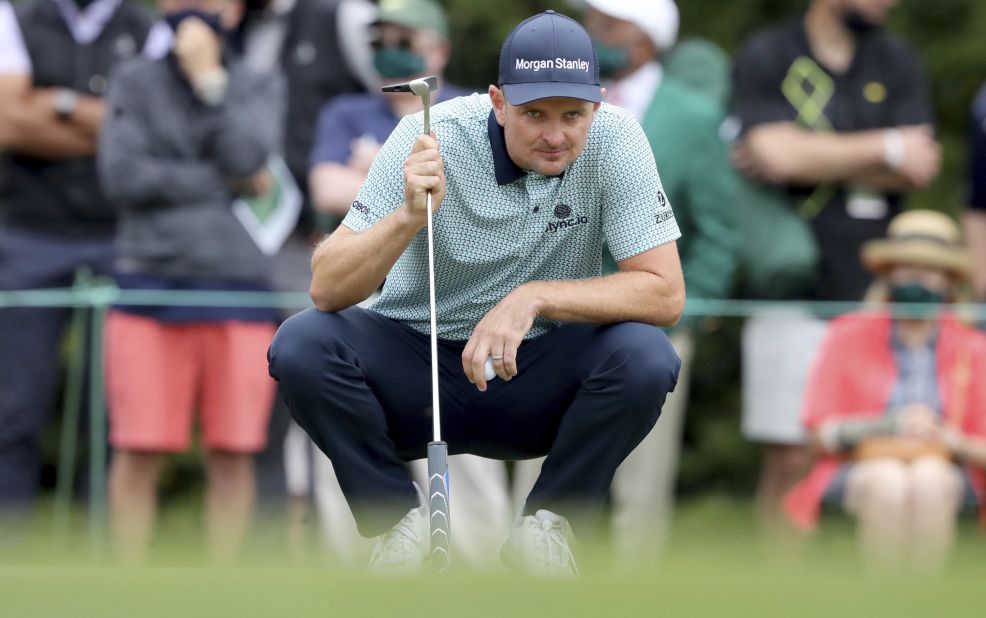 Justin Rose eyes a par putt on the first hole Friday. Rose held a one-shot lead heading into the weekend.