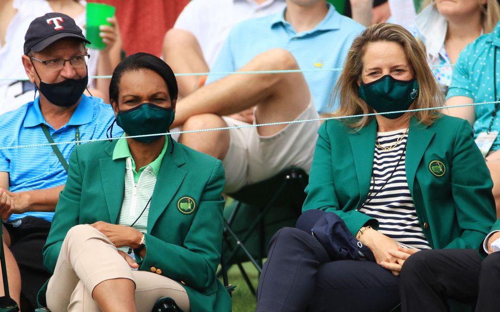 Former US Secretary of State Condoleezza Rice, left, watches the action along with fellow Augusta National member Heidi Ueberroth on Friday.