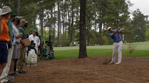 Bryson DeChambeau hits out of the pine straw on the seventh hole during the second round of the Masters.