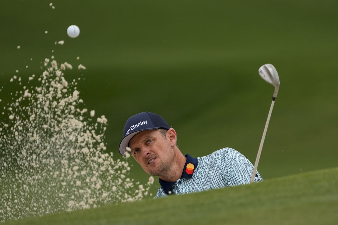 Justin Rose hits out of a bunker on the seventh hole during the second round of the Masters.
