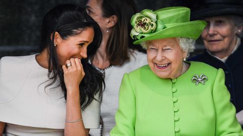 The Queen and Meghan share a laugh at an event in 2018.