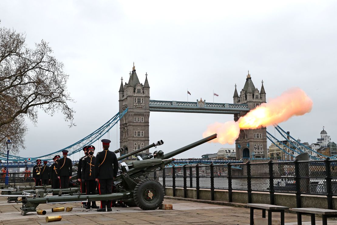 The Honourable Artillery Company fire a gun salute near London's Tower Bridge on April 10