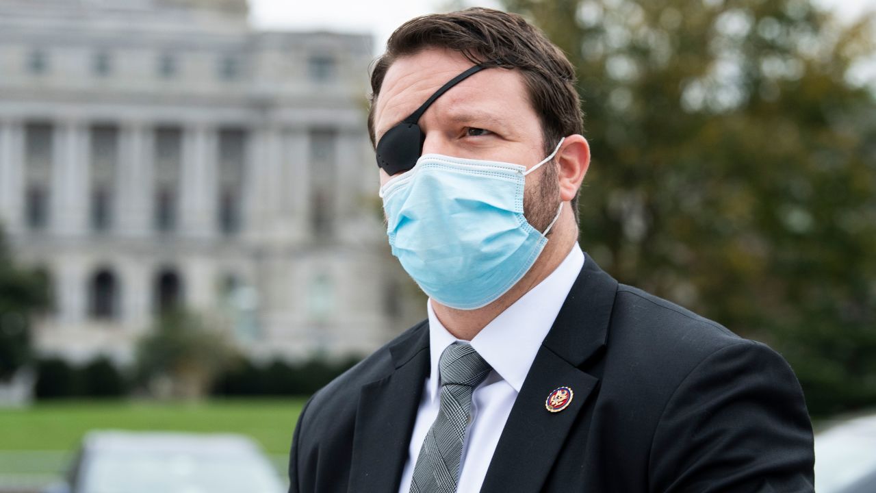 Rep. Dan Crenshaw, R-Texas, is seen at the House steps of the Capitol during votes on Friday, December 4, 2020.
