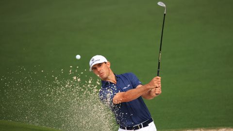 US golfer Billy Horschel plays a shot from a bunker on the second hole during the third round of the Masters on Saturday, April 10, in Augusta, Georgia.