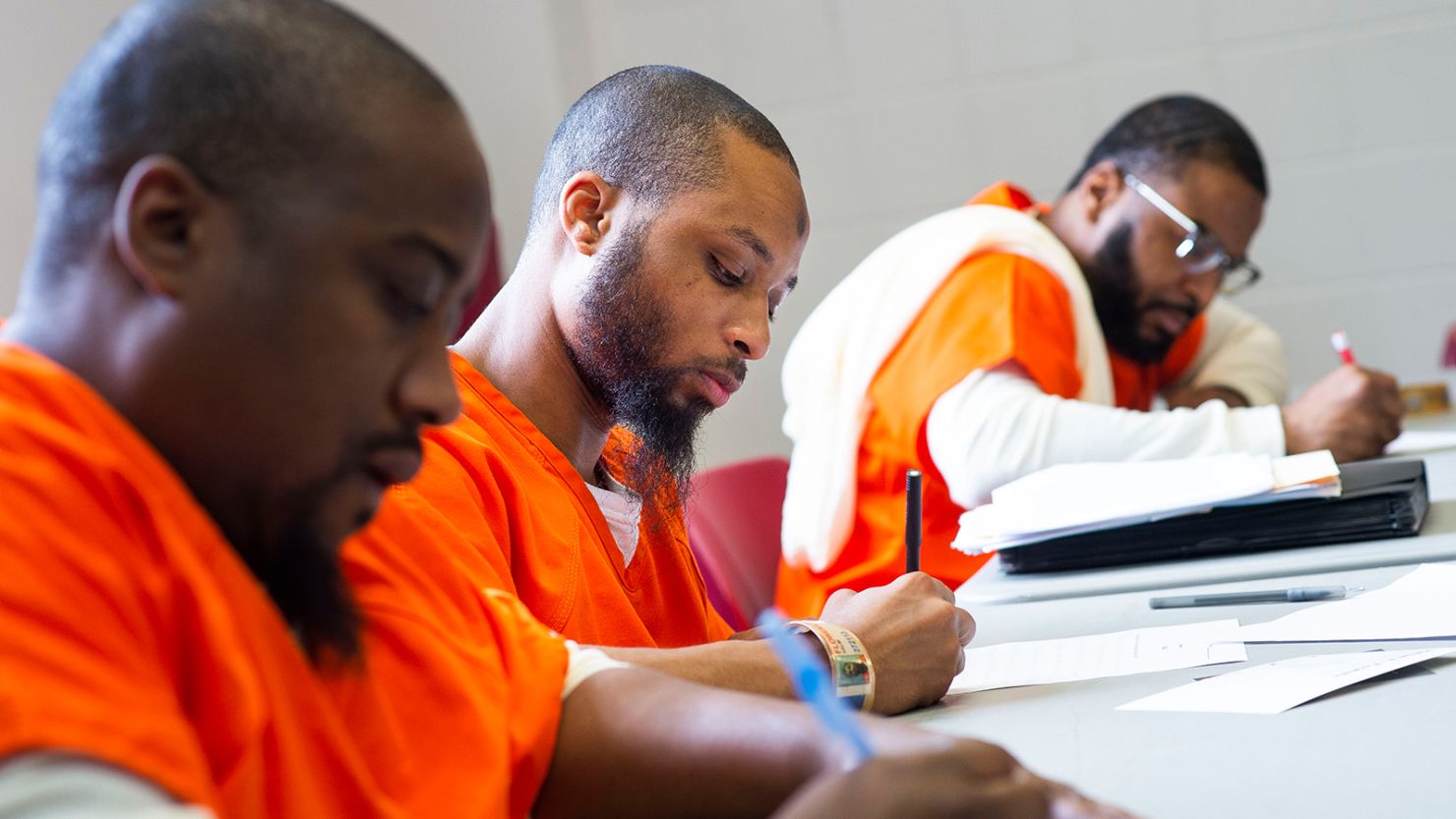 Inmates taking notes during a democracy class at the DC Jail in fall 2018.