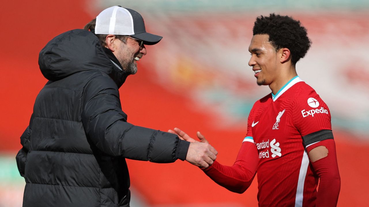Trent Alexander-Arnold (right) is congratulated by Jurgen Klopp after scoring the winner against Aston Villa.