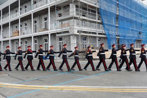 Members of the Royal Gibraltar Regiment march before firing a 41-gun salute in Gibraltar on Saturday, April 10.