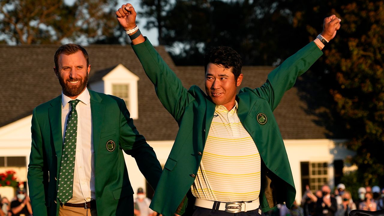 Matsuyama puts on the champion's Green Jacket after winning the Masters.
