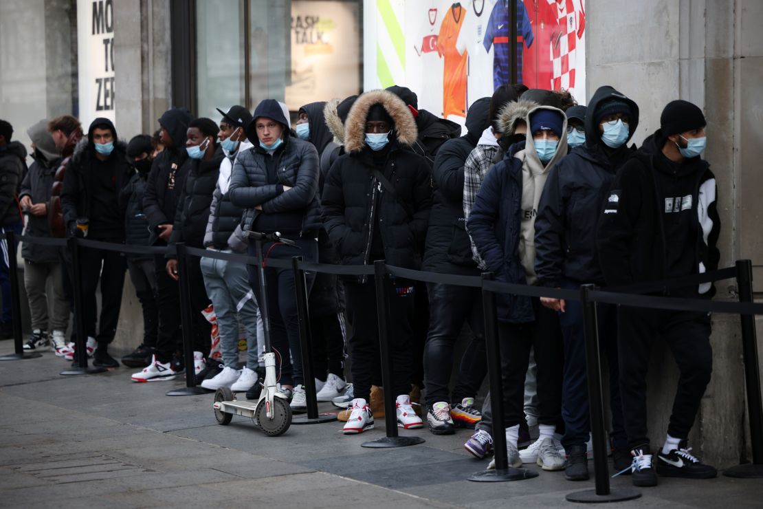 People lined up outside Nike Town on London's Oxford Street on Monday.