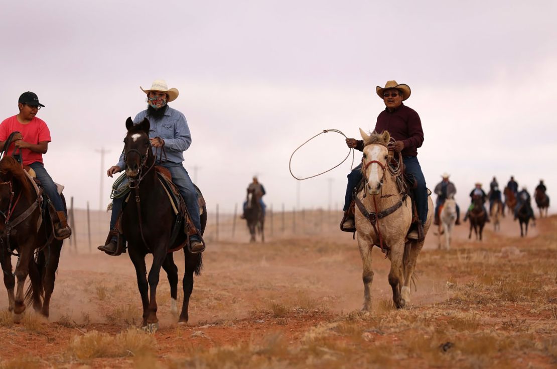 Voters traveling on horseback from El Capitan to Kayenta, Arizona, to cast their ballots on Election Day for the 2020 presidential election as part of the Ride to the Polls campaign.