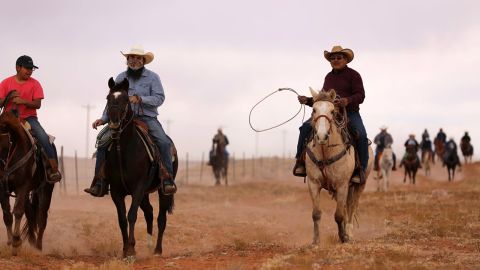 Voters traveling on horseback from El Capitan to Kayenta, Arizona, to cast their ballots on Election Day for the 2020 presidential election as part of the Ride to the Polls campaign.
