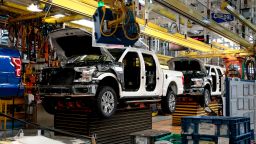This photo shows Ford 2018 and 2019 F-150 trucks on the assembly line at the Ford Motor Company's Rouge Complex on September 27, 2018 in Dearborn, Michigan.  Ford Motor Company's Rouge complex is the only one in American history to manufacture vehicles  including ships, tractors and cars  non-stop for 100 years. (Photo by Jeff Kowalsky/AFP/Getty Images)