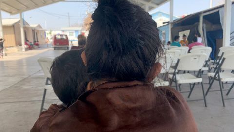 A 31-year-old migrant mom from El Salvador hugs her youngest son as they seek refuge at a shelter in Reynosa, Mexico. Weeks ago, she watched in anguish as her older sons crossed the border alone.