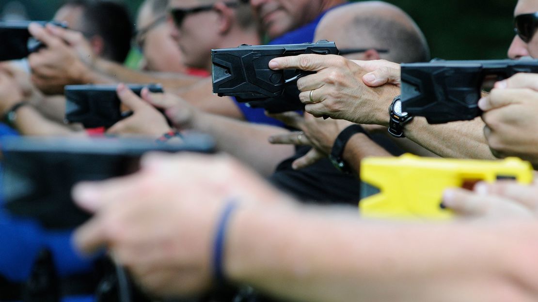 Law enforcement and park rangers use a variety of Tasers during training in 2014.