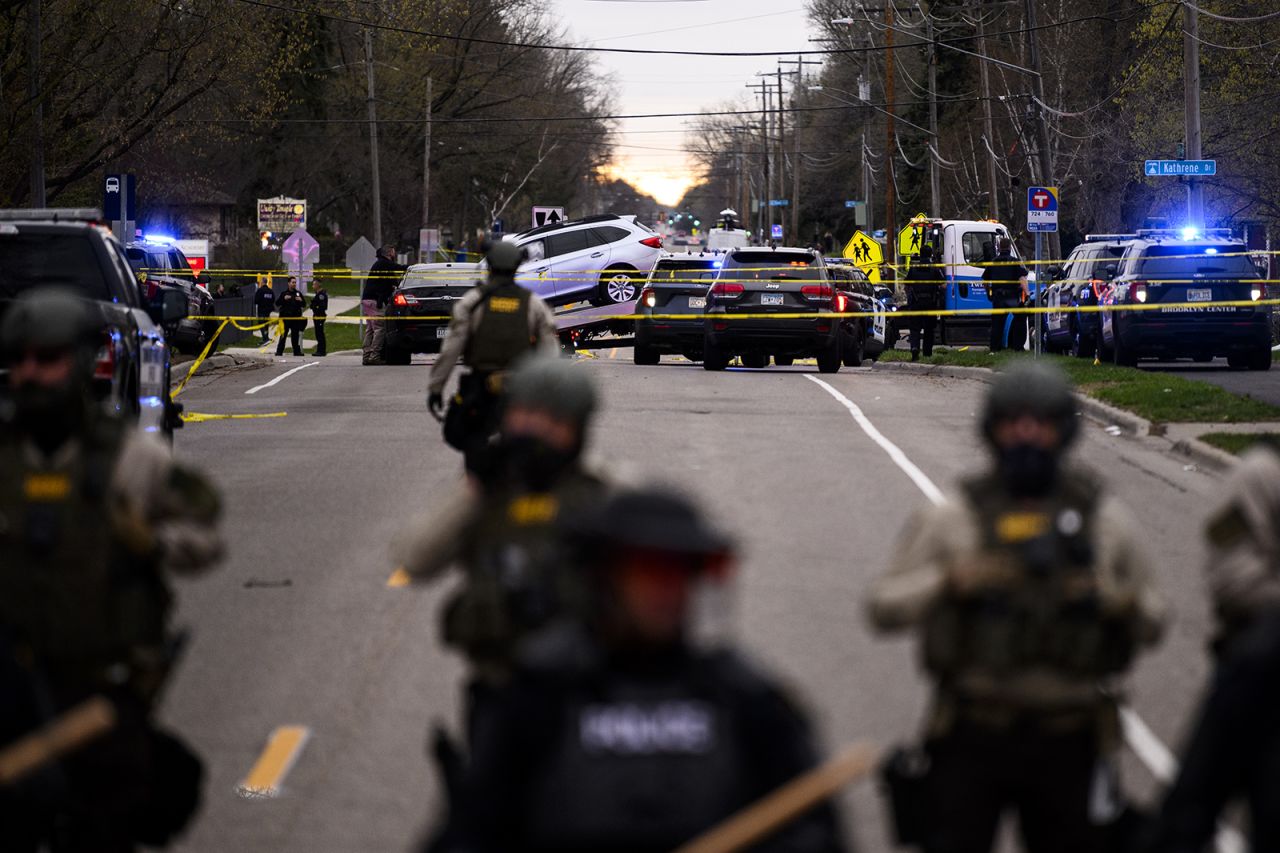 A vehicle is towed away from the scene where Wright was killed on Sunday.