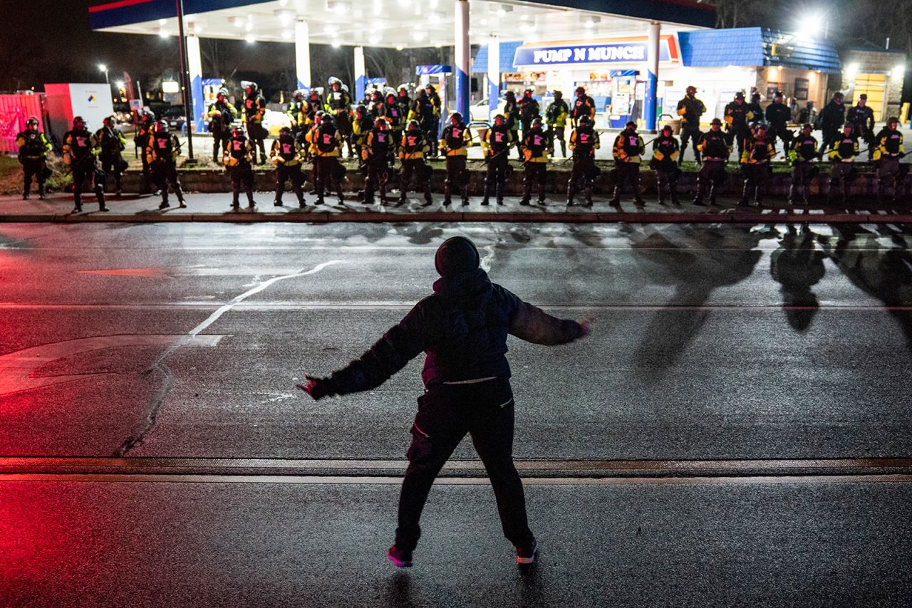A demonstrator taunts authorities on Monday.