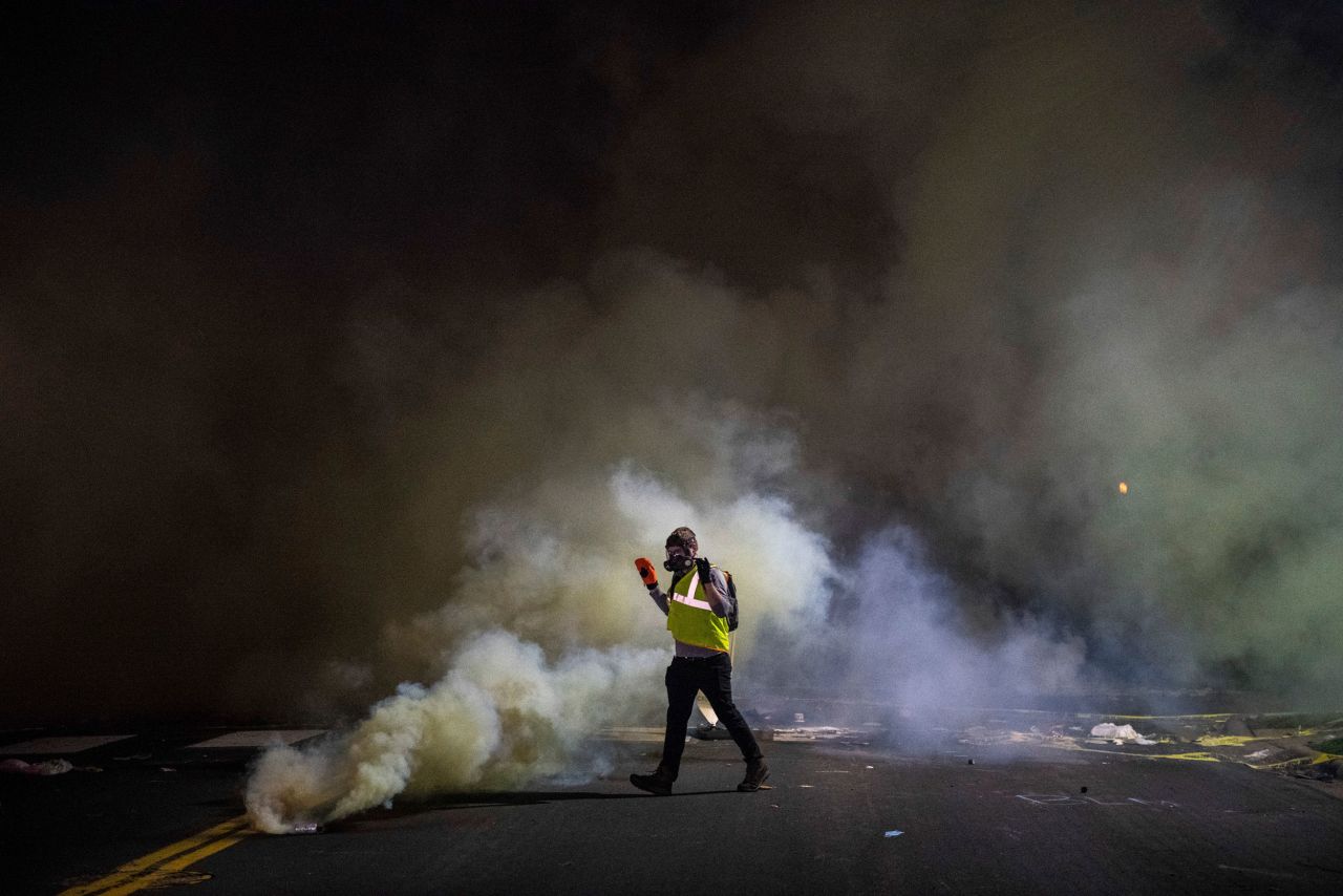 Protesters clash with police on Sunday.