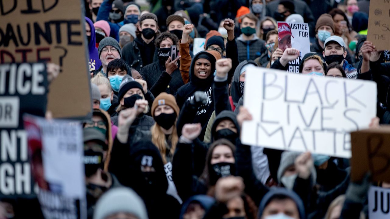 Protesters gather at the Brooklyn Center Police Department on Monday.