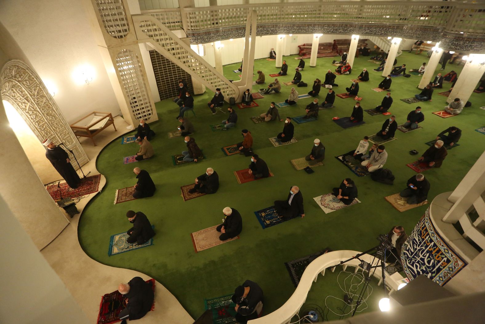 People spread out as they pray at a mosque in Zagreb, Croatia.