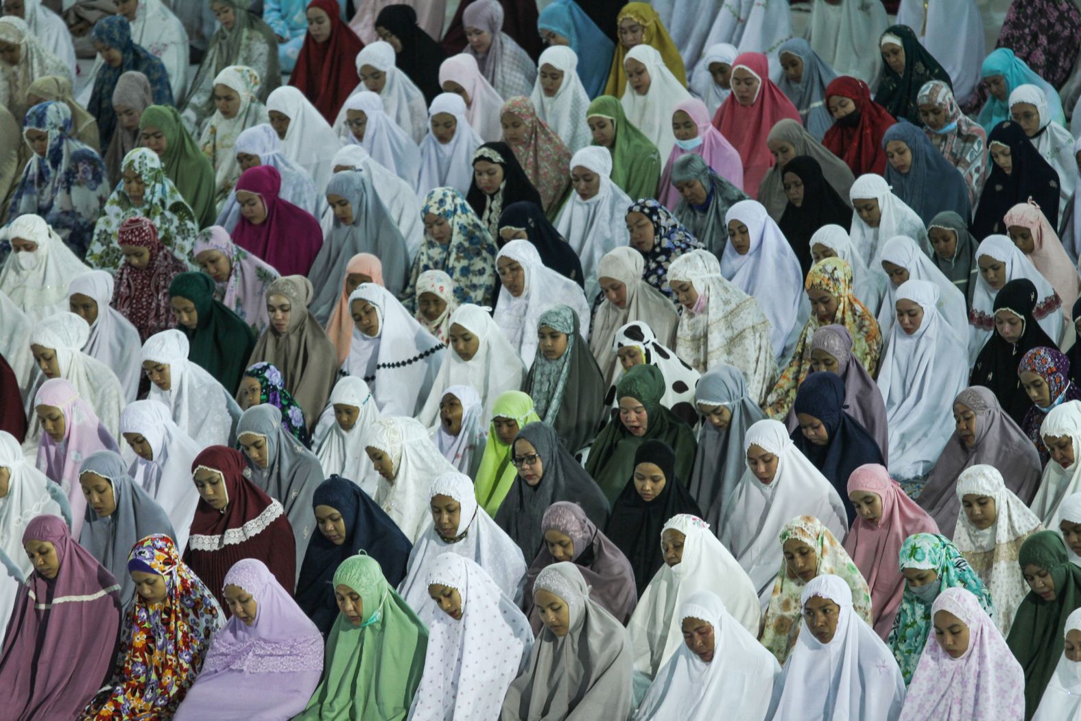 Muslims pray at a mosque in Lhokseumawe, Indonesia.
