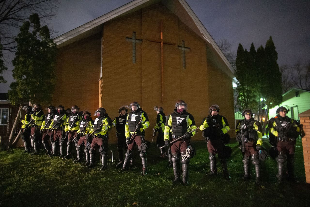 Minnesota state troopers stand guard during Monday's protests in Brooklyn Center.