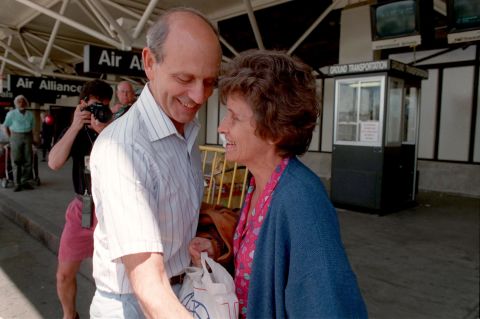 Breyer and his wife, Joanna, are seen at Boston's Logan Airport in May 1994.