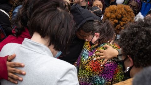 Katie Wright, center, the mother of Daunte Wright, is embraced by family members and the girlfriend of George Floyd at a news conference outside the Hennepin County Government Center in Minneapolis on Tuesday.