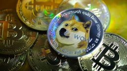 KATWIJK, NETHERLANDS - JANUARY 29: In this photo illustration visual representations of digital cryptocurrencies, Dogecoin and Bitcoin, are displayed on January 29, 2021 in Katwijk, Netherlands.  (Photo by Yuriko Nakao/Getty Images)