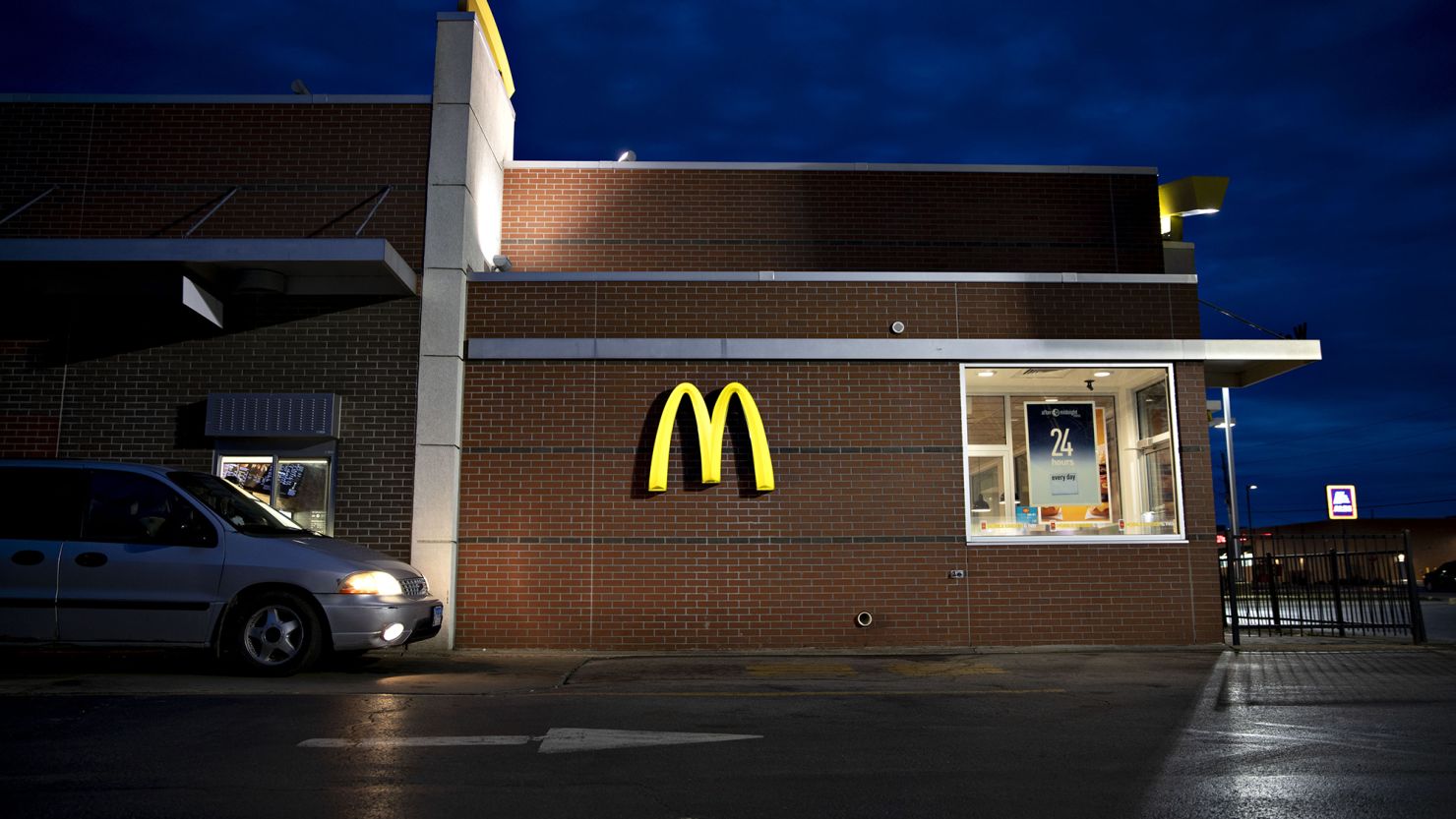 A vehicle sits in the drive-thru of a McDonald's Corp. restaurant in Peru, Illinois, U.S., on Wednesday, March 27, 2019. McDonald's, in its largest acquisition in 20 years, is buying a decision-logic technology company to better personalize menus in its digital push. Photographer: Daniel Acker/Bloomberg via Getty Images