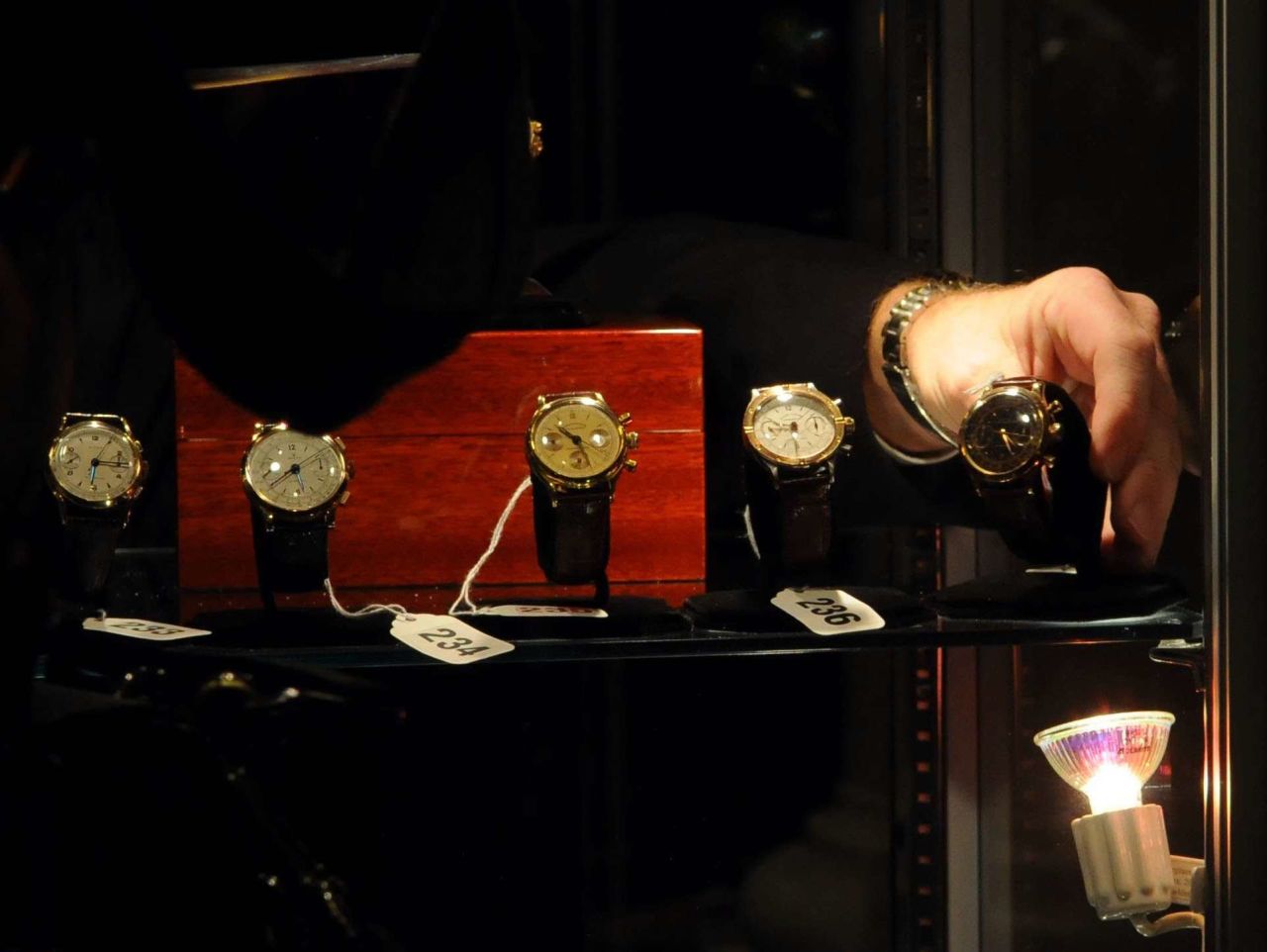 Watches that belonged to Bernie Madoff are seen before an auction in New York in November 2009. Some of Madoff's property has been auctioned off over the years, compensating the victims of his $20 billion Ponzi scheme -- the largest financial fraud in history.