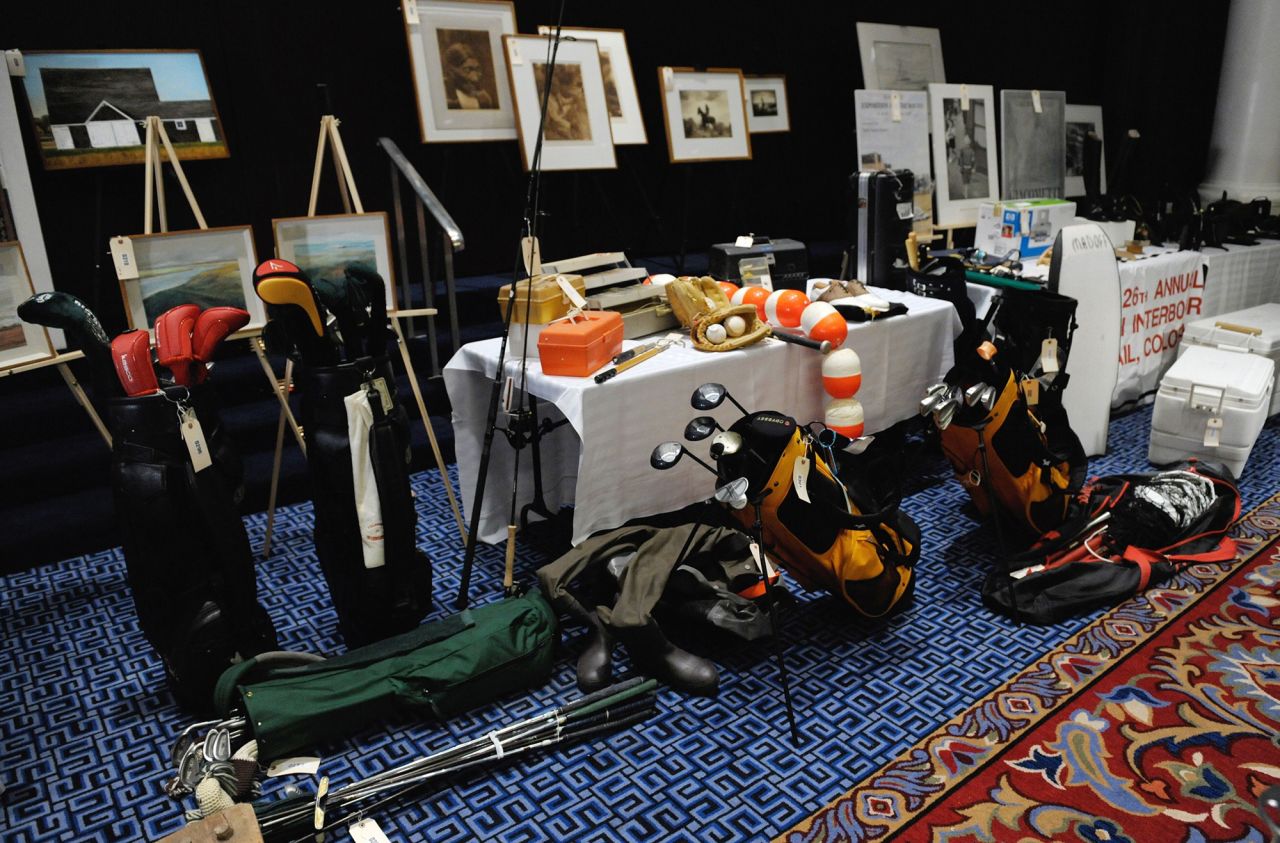 Golf clubs and fishing gear are displayed ahead of an auction of Madoff property.