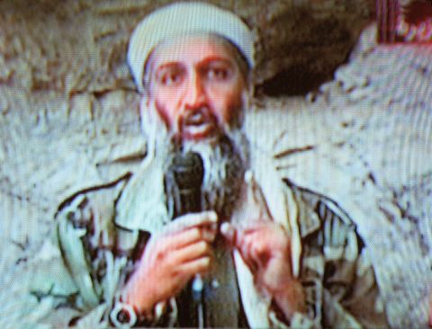 Al Qaeda leader Osama bin Laden is seen at an undisclosed location in this television image broadcast on October 7, 2001. Bin Laden praised God for the September 11 attacks and swore America "will never dream of security" until "the infidel's armies leave the land of Muhammad."